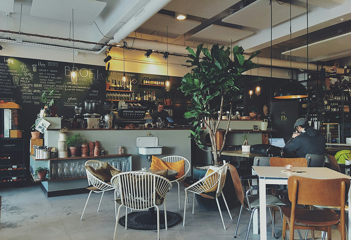 coffee shop filled with busy customers | hard bean